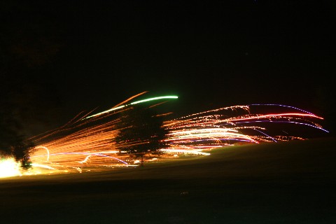 The battle rages into the night with cannons blazing.
